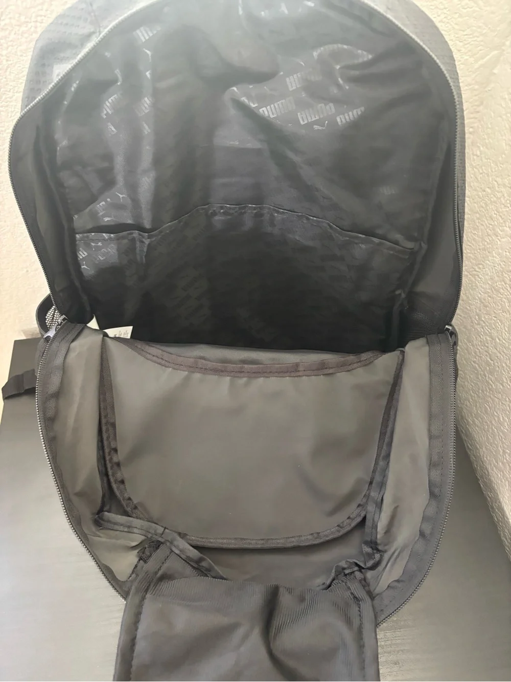 Puma Black Backpack with Copper Puma Logo